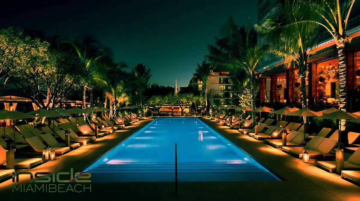 Under Miami's starlit sky, the Miami EDITION Hotel glows with nocturnal allure