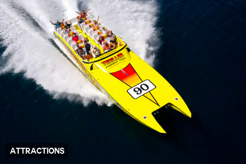 Thrilled tourists on a speedboat sightseeing tour, experiencing the adrenaline rush and captivating views of the Miami Beach skyline