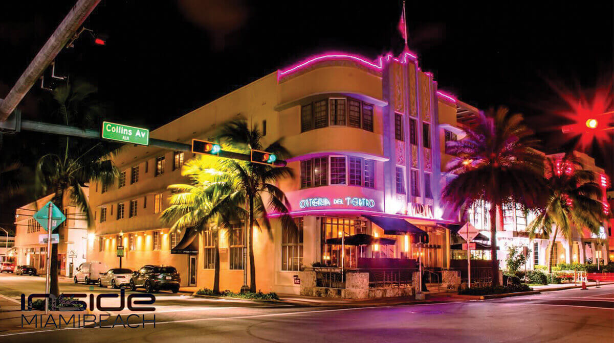 Under the moonlit sky, Osteria Del Teatro's neon glow beckons lovers of romance and fine dining alike