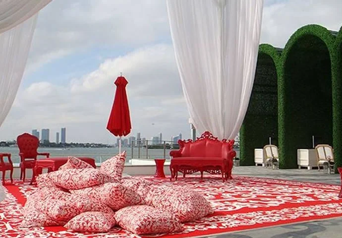 A stunning night view of Mondrian South Beach’s exterior, illuminating its modern design