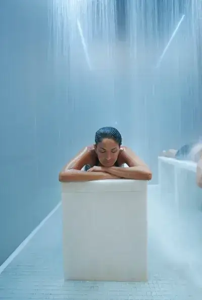 Lapis Spa: Relax on lounge chairs by the coed mineral pool.